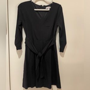 Loft black long sleeve dress with waist tie and pockets. Ruching on sleeves.